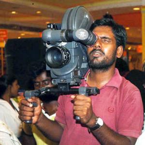 Shooting Angadi Theru from his shoulders!