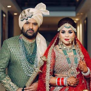 PIX: Kapil weds Ginni