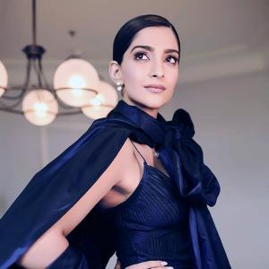 Pix: Sonam flirts with purple and red at Cannes!