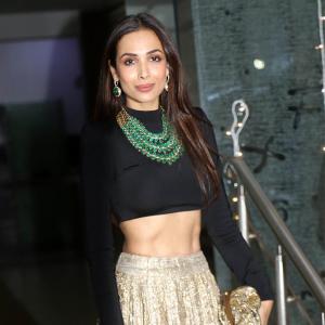 Who is Malaika partying with?