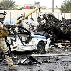 Car bombs rock Baghdad again; 127 killed