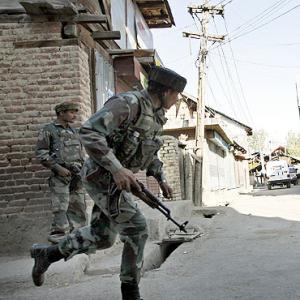 Forces surround Sopore to flush out terrorists