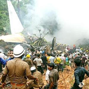 Pix: Grim rescue at Mangalore crash site 
