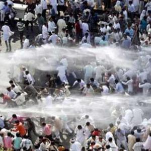 More tear gas, water canons to quell Delhi protests