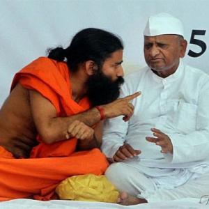 Hazare, Ramdev pull UPA govt by the collar