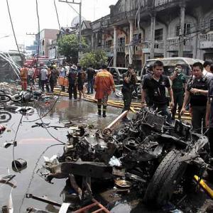 In PHOTOS: Deadly triple blasts rock south Thailand