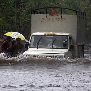 In PHOTOS: Rains hit road, rail traffic in Mumbai, Thane