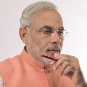 Modi wonders how FDI call came day after Sonia's US trip