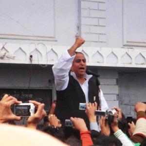 Azam Khan 'gifts' broom, pen to MLAs; taunts Modi