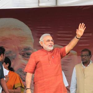 Modi stitches up a wider political alliance at Hyderabad