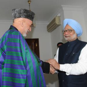 Karzai meets PM; defence aid, BSA figure in talks