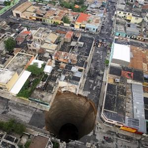 PHOTOS: Ever seen such giant sinkholes?