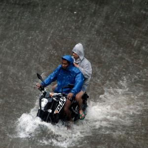 Record rains flood Mumbai, leave it limping