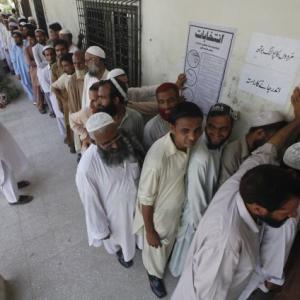 Pakistanis vote in historic polls, 24 killed in violence