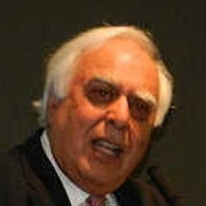Sibal gets addn charge of law ministry, Joshi gets railways