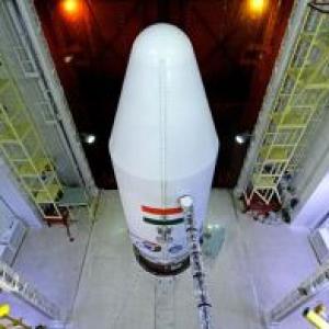 Amidst euphoria, some voices question cost of Mars mission
