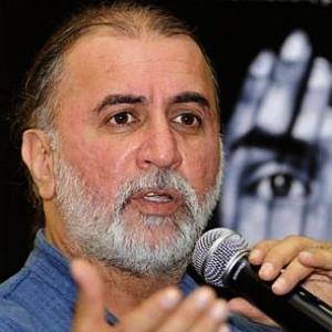 CCTV shows Tejpal pulling woman into hotel lift: Police