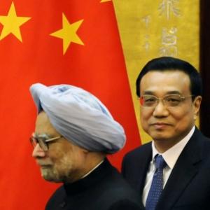 PM raises issue of stapled visas with Li Keqiang