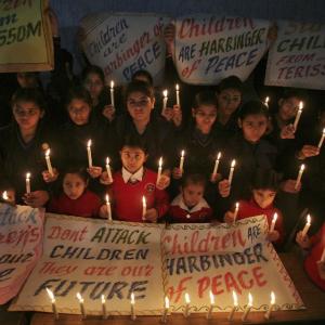 Indian students pay silent tribute to victims of Peshawar tragedy
