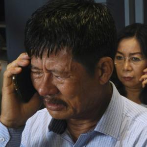 AirAsia QZ8501: Relatives of 162 passengers wait anxiously for news of missing plane