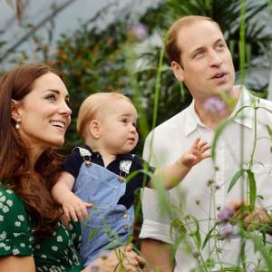 Prince George is king of the world on his first birthday