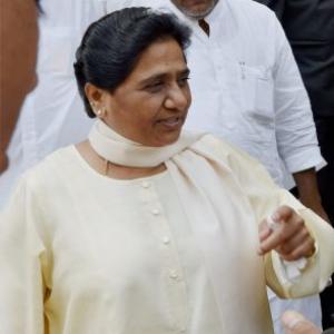 Mayawati demands dismissal of UP govt, stages walkout in RS