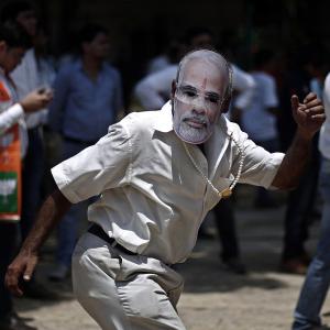 Riding on Modi wave, BJP and allies get 336 seats