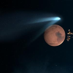 PHOTOS: Mountain-sized comet whizzes past Mars after a million years