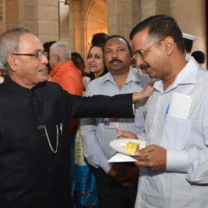 Have some more, no harm: Pranab tells Kejriwal at tea party