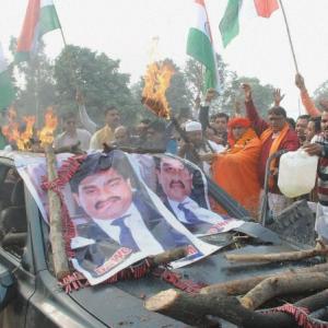 Dawood's auctioned green sedan set on fire, scrap to be used in toilet
