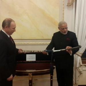 Putin gifts Modi 18th century sword and Bapu's handwritten notes