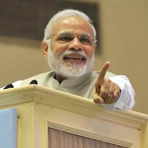 Modi takes a dig at Kejriwal over power bills
