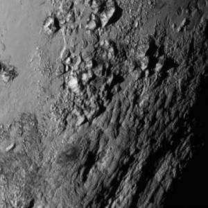 FIRST PHOTOS: A whole new world on Pluto
