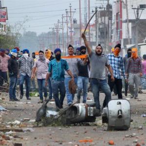 Ignoring curfew, Sikh protesters block Jammu-Pathankot National Highway