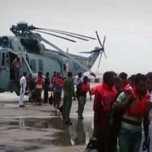 Navy saves 20 people from listing vessel in dramatic rescue ops