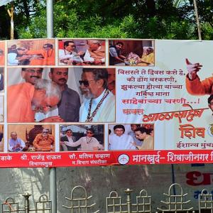 In new poster war, Sena shows Modi bowing before Bal Thackeray