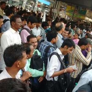 PHOTOS: Mumbai hassled with train delays, traffic snarls for second day