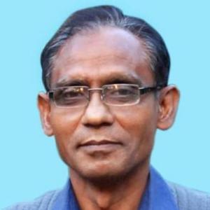 Bangladesh professor hacked to death near his home