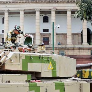 Tanks and missiles enter Parliament complex
