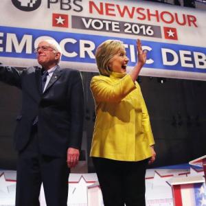 Race to White House: Clinton, Sanders spar over Obama, immigration