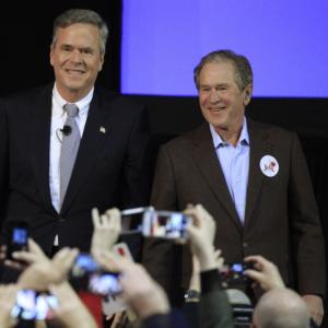 PHOTOS: George W Bush returns to spotlight to campaign for brother Jeb
