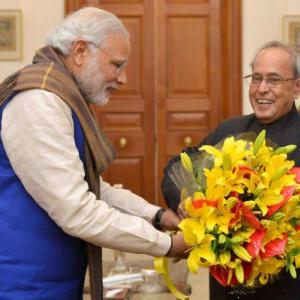 PM Modi greets nation on New Year; visits President Mukherjee, VP Ansari