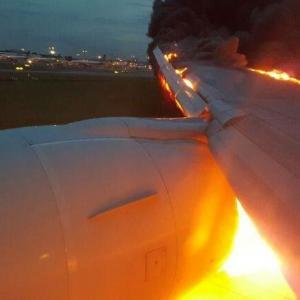 Narrow escape for 240 passengers as Singapore Airlines jet catches fire