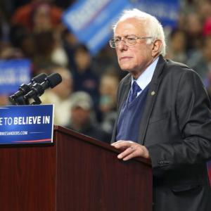 Sanders vows to help Clinton beat Trump; keeps campaign alive