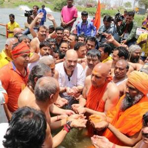 Amit Shah takes holy dip alongside Dalit sadhus at Kumbh