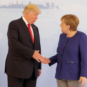 It finally happened! Trump shakes hands with Merkel