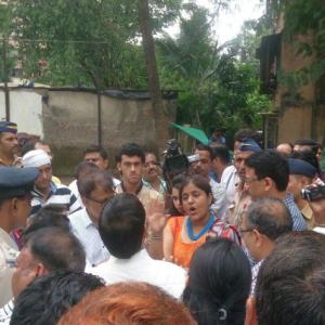 At Mumbai building crash site, residents wait with hope