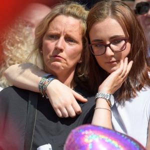 PHOTOS: Britain unites in silence to pay tribute to Manchester victims