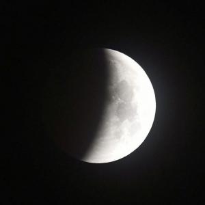 Cloudy skies leave eclipse watchers wanting more