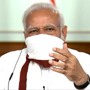 Modi wears homemade mask at meet with CMs